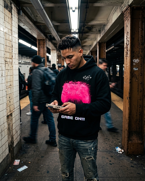 Black game on hoodie with Pink bleeding controller