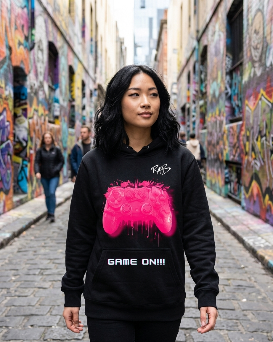 Black game on hoodie with Pink bleeding controller