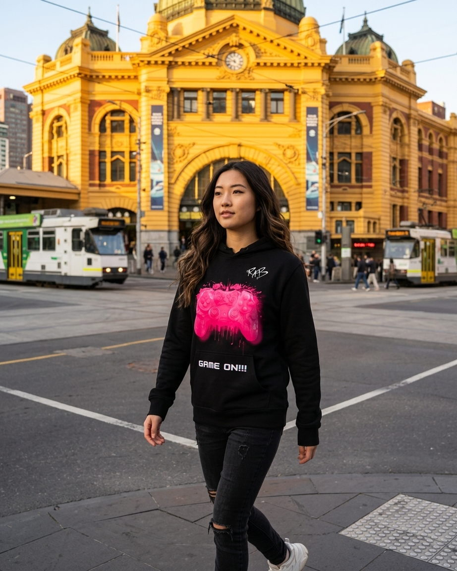 Black game on hoodie with Pink bleeding controller